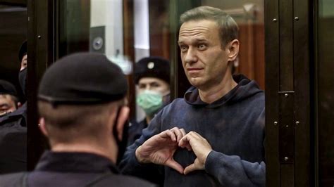 Russian court opens trial of jailed opposition leader Alexei Navalny that could keep him behind bars for decades